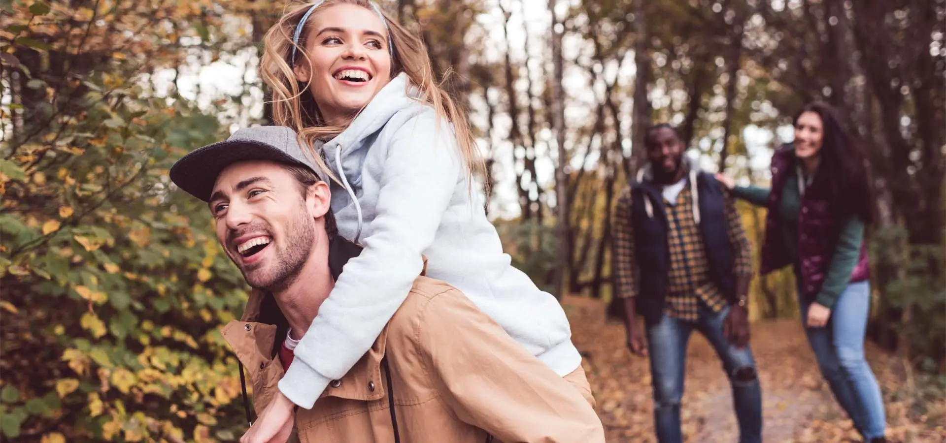 A couple happy on an outdoor adventure.